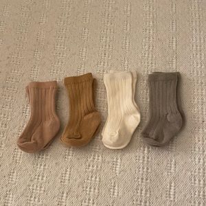Set of 4 pairs of neutral-colored baby socks